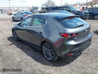 2021 Mazda Mazda3 Hatchback Select with VIN JM1BPBKLXM1337797, listed as a IAAI auction lot 42018058 with 46,763 mi miles. Bid and sale history available at carsss.com. Image 3.
