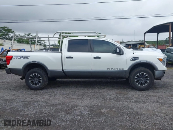 2017 Nissan Titan XD PRO-4X with VIN 1N6BA1F47HN517135, listed as a IAAI auction lot 41605323 with 108,984 mi miles. Bid and sale history available at carsss.com. Image 13.