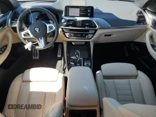 2021 BMW X4 xDrive30i z VIN 5UX2V1C09M9G11692, wystawiony jako Copart lot #51512115 z przebiegiem 16 948 mil mil oraz Szkoda całkowita • Salvage title. Historia ofert i sprzedaży dostępna na DreamBid. Obrazek 8.