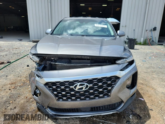 2019 Hyundai Santa Fe SE с VIN 5NMS23AD7KH134965, выставлен на аукционе Copart как лот 63212975 с пробегом 50 196 миль миль и Списание • Salvage title. История ставок и продаж доступна на DreamBid. Изображение 5.