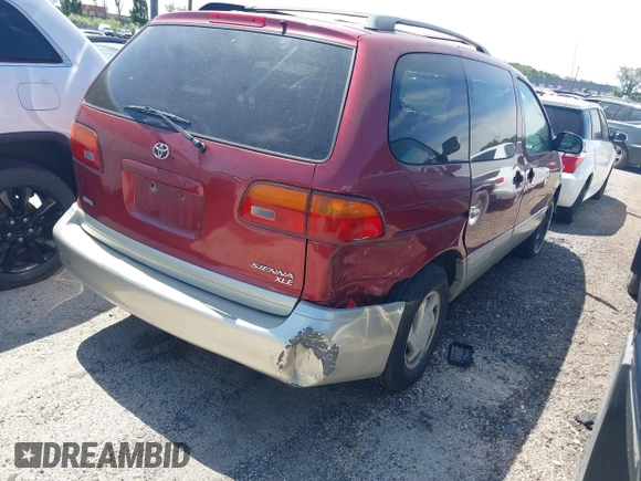 1998 Toyota Sienna LE with VIN 4T3ZF13C2WU049089, listed as a IAAI auction lot 41887109 with 323,601 mi miles and . Bid and sale history available at DreamBid. Image 4.