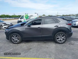 2021 Mazda CX-30 Preferred with VIN 3MVDMACLXMM228431, listed as a IAAI auction lot 41575602 with 67,854 mi miles. Bid and sale history available at carsss.com. Image 14.