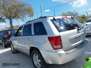2010 Jeep Grand Cherokee Laredo with VIN 1J4PS4GK3AC163307, listed as a IAAI auction lot 41681527 with 155,464 mi miles. Bid and sale history available at carsss.com. Image 3.