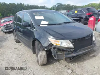 2012 Honda Odyssey EX-L z VIN 5FNRL5H60CB079065, wystawiony jako IAAI lot #42253968 z przebiegiem 227 204 mil mil oraz . Historia ofert i sprzedaży dostępna na DreamBid. Obrazek 1.