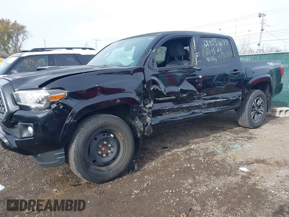 2018 Toyota Tacoma SR5 with VIN 3TMAZ5CN6JM055632, listed as a IAAI auction lot 40751593 with 125,663 mi miles and . Bid and sale history available at DreamBid. Image 6.