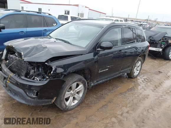 2015 Jeep Compass High Altitude Edition with VIN 1C4NJDEB9FD396502, listed as a IAAI auction lot 41757194 with 157,928 mi miles. Bid and sale history available at carsss.com. Image 2.
