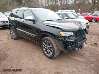 2017 Jeep Grand Cherokee Overland with VIN 1C4RJECG4HC878258, listed as a IAAI auction lot 41361352 with 137,574 mi miles. Bid and sale history available at carsss.com. Image 1.