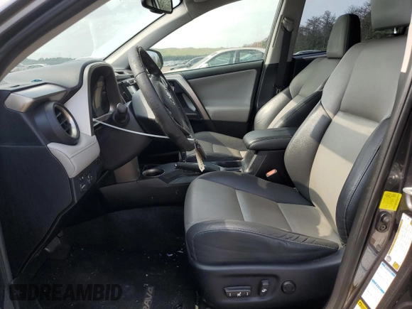 2015 Toyota RAV4 Limited with VIN JTMDFREV3FJ026913, listed as a Copart auction lot 65201135 with 74,354 mi miles and Salvage title. Bid and sale history available at DreamBid. Image 7.