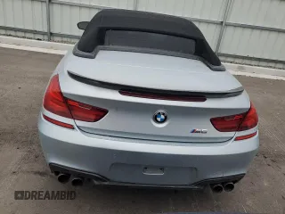 2014 BMW M6 z VIN WBSLZ9C56EDZ78719, wystawiony jako Copart lot #42445545 z przebiegiem 63 691 mil mil oraz Szkoda całkowita • Salvage title. Historia ofert i sprzedaży dostępna na DreamBid. Obrazek 6.