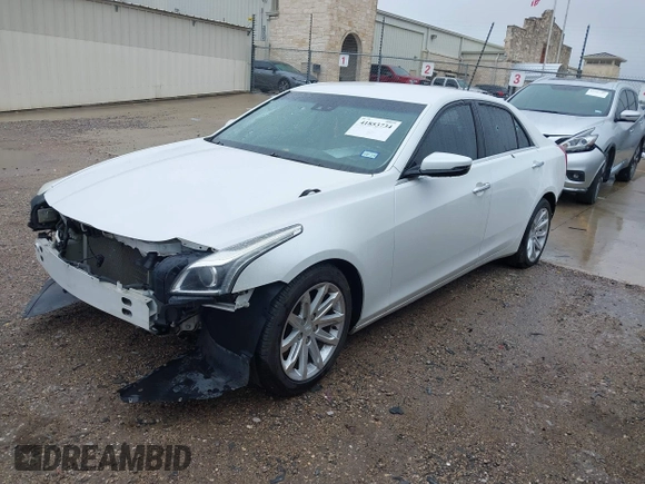 2015 Cadillac CTS Luxury RWD z VIN 1G6AR5S32F0123986, wystawiony jako IAAI lot #41853734 z przebiegiem 108 043 mil mil oraz . Historia ofert i sprzedaży dostępna na DreamBid. Obrazek 17.
