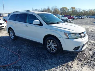 2013 Dodge Journey SXT with VIN 3C4PDCBG4DT571109, listed as a IAAI auction lot 41778781 with 171,308 mi miles. Bid and sale history available at carsss.com. Image 1.