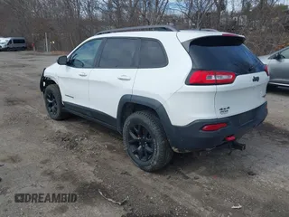 2014 Jeep Cherokee Trailhawk with VIN 1C4PJMBS5EW240375, listed as a IAAI auction lot 41806725 with 127,705 mi miles. Bid and sale history available at carsss.com. Image 3.