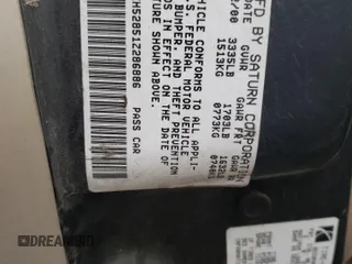 2001 Saturn SL z VIN 1G8ZH52851Z286886, wystawiony jako Copart lot #84883824 z przebiegiem Nie podano mil oraz Szkoda całkowita • Salvage title. Historia ofert i sprzedaży dostępna na DreamBid. Obrazek 12.