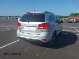 2013 Dodge Journey SXT with VIN 3C4PDCBG2DT661360, listed as a IAAI auction lot 42742522 with 155,973 mi miles and . Bid and sale history available at DreamBid. Image 4.