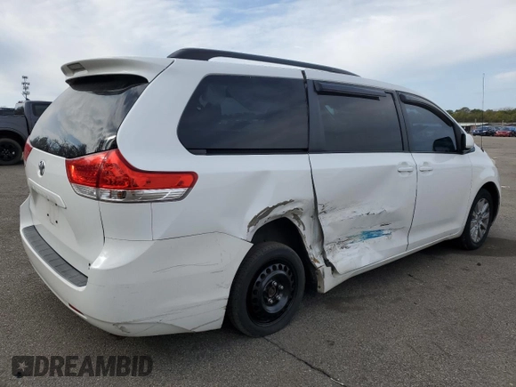 2012 Toyota Sienna LE with VIN 5TDJK3DC5CS040337, listed as a Copart auction lot 50701935 with 201,024 mi miles and Salvage Title. Bid and sale history available at carsss.com. Image 3.