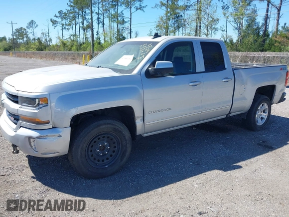 2018 Chevrolet Silverado 1500 LT with VIN 1GCVKREC9JZ335603, listed as a IAAI auction lot 41853399 with 152,460 mi miles and . Bid and sale history available at DreamBid. Image 2.