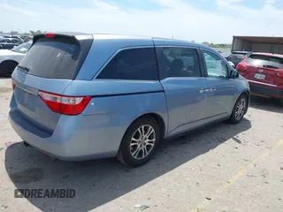 2013 Honda Odyssey EX z VIN 5FNRL5H4XDB062760, wystawiony jako IAAI lot #42063899 z przebiegiem 181 658 mil mil oraz . Historia ofert i sprzedaży dostępna na DreamBid. Obrazek 4.