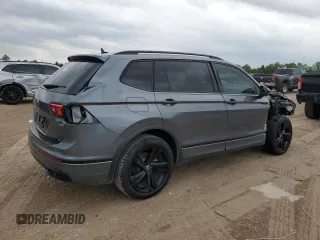 2023 Volkswagen Tiguan SE R-Line Black z VIN 3VVCB7AX6PM013498, wystawiony jako Copart lot #55750805 z przebiegiem 31 190 mil mil oraz Szkoda całkowita • Salvage title. Historia ofert i sprzedaży dostępna na DreamBid. Obrazek 3.