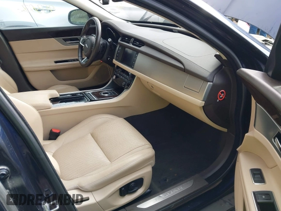 2018 Jaguar XF with VIN SAJBE4EV5JCY56577, listed as a IAAI auction lot 41520046 with 90,307 mi miles and . Bid and sale history available at DreamBid. Image 5.