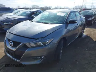 2016 Nissan Maxima SV z VIN 1N4AA6AP5GC412767, wystawiony jako IAAI lot #41650129 z przebiegiem 83 521 mil mil oraz . Historia ofert i sprzedaży dostępna na DreamBid. Obrazek 18.