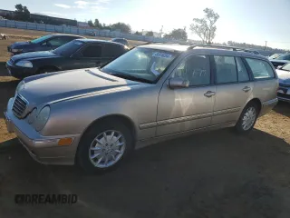 2000 Mercedes-Benz E-Class with VIN WDBJH65J6YB012332, listed as a Copart auction lot 80918284 with 186,616 mi miles and Clean Title. Bid and sale history available at carsss.com. Image 1.