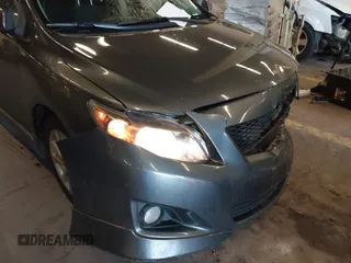 2010 Toyota Corolla with VIN 2T1BU4EE8AC510757, listed as a IAAI auction lot 41589152 with 164,857 mi miles. Bid and sale history available at carsss.com. Image 12.