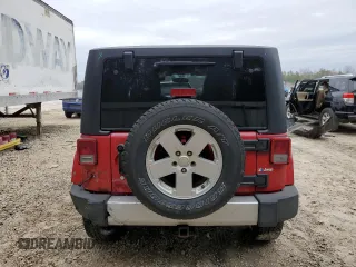 2012 Jeep Wrangler Arctic z VIN 1C4AJWBG9CL123832, wystawiony jako Copart lot #87376204 z przebiegiem 174 097 mil mil oraz Szkoda całkowita • Salvage title. Historia ofert i sprzedaży dostępna na DreamBid. Obrazek 6.