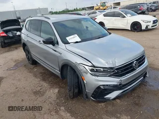 2022 Volkswagen Tiguan SE R-Line Black z VIN 3VVCB7AX6NM075609, wystawiony jako IAAI lot #42156893 z przebiegiem 189 280 mil mil oraz . Historia ofert i sprzedaży dostępna na DreamBid. Obrazek 1.