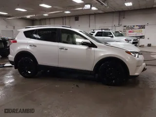 2018 Toyota RAV4 Limited with VIN JTMDFREV6JJ186499, listed as a IAAI auction lot 41668544 with 130,336 mi miles. Bid and sale history available at carsss.com. Image 14.