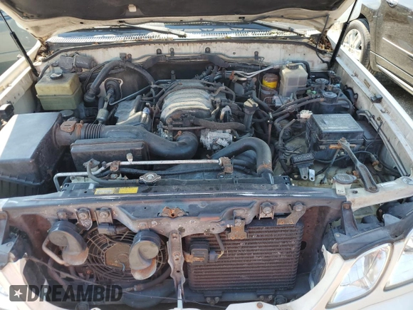 2000 Lexus LX 470 with VIN JT6HT00W2Y0106774, listed as a Copart auction lot 74762004 with Not Provided miles and Salvage Title. Bid and sale history available at DreamBid. Image 12.