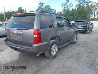 2012 Chevrolet Tahoe LT z VIN 1GNSCBE08CR320257, wystawiony jako IAAI lot #42214920 z przebiegiem 189 532 mil mil oraz . Historia ofert i sprzedaży dostępna na DreamBid. Obrazek 4.