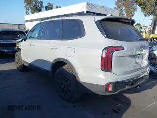 2025 Kia Telluride SX-Prestige X-Line with VIN 5XYP5DGCXSG579857, listed as a IAAI auction lot 42213332 with 4,738 mi miles and . Bid and sale history available at DreamBid. Image 3.