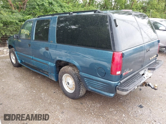 1995 GMC Suburban with VIN 1GDFK16K8SJ741041, listed as a IAAI auction lot 42315676 with 159,312 mi miles and . Bid and sale history available at DreamBid. Image 3.