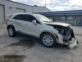 2017 Cadillac XT5 FWD with VIN 1GYKNARSXHZ158528, listed as a Copart auction lot 59761385 with 100,238 mi miles and Salvage title. Bid and sale history available at DreamBid. Image 4.
