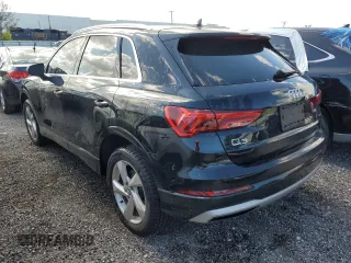 2019 Audi Q3 Premium with VIN WA1AECF37K1076119, listed as a Copart auction lot 49902943 with 56,621 mi miles. Bid and sale history available at carsss.com. Image 2.
