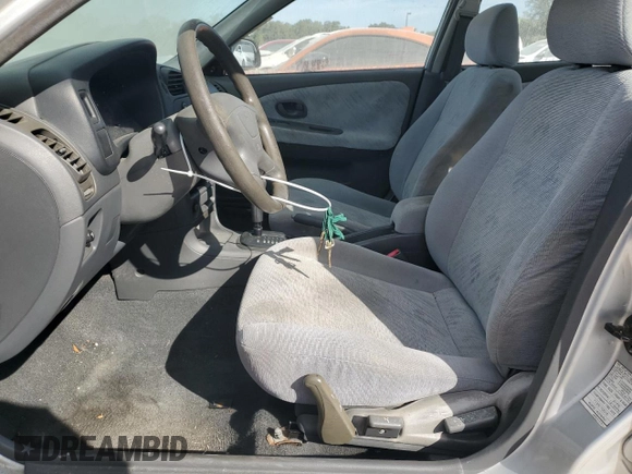 2001 Mitsubishi Mirage ES z VIN JA3AY26CX1U030593, wystawiony jako Copart lot #83749264 z przebiegiem 107 641 mil mil oraz Szkoda całkowita • Salvage title. Historia ofert i sprzedaży dostępna na DreamBid. Obrazek 7.