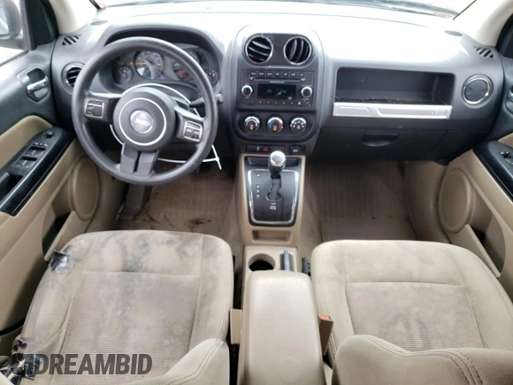 2014 Jeep Compass Sport with VIN 1C4NJDBB9ED670610, listed as a Copart auction lot 52691825 with 150,525 mi miles and Salvage Title. Bid and sale history available at carsss.com. Image 8.
