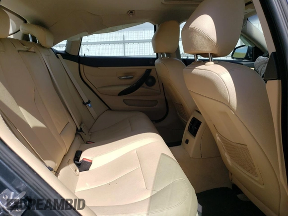 2015 BMW 4 Series 428i z VIN WBA4A5C53FG051038, wystawiony jako Copart lot #54909705 z przebiegiem 101 536 mil mil oraz Nie do naprawy • Non repairable. Historia ofert i sprzedaży dostępna na DreamBid. Obrazek 10.
