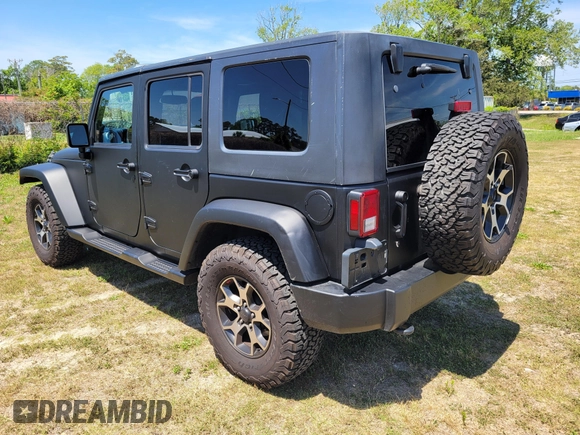 2014 Jeep Wrangler Unlimited Sport with VIN 1C4HJWDG4EL159619, listed as a IAAI auction lot 42176313 with 79,715 mi miles and . Bid and sale history available at DreamBid. Image 3.