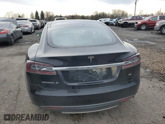 2014 Tesla Model S 60 with VIN 5YJSA1H18EFP45810, listed as a Copart auction lot 86313244 with Not Provided miles and Salvage Title. Bid and sale history available at DreamBid. Image 6.