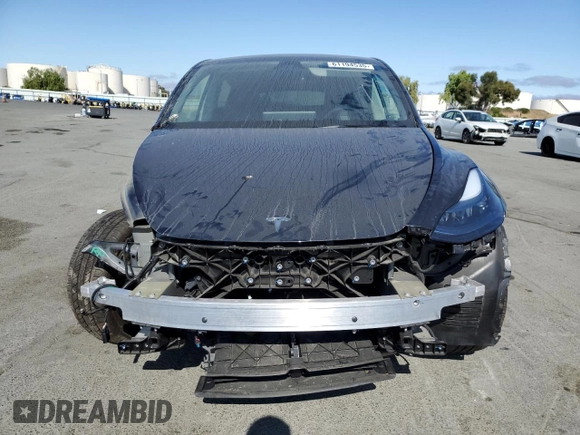 2024 Tesla Model Y Long Range с VIN 7SAYGDEE8RF184146, выставлен на аукционе Copart как лот 61194535 с пробегом 8 225 миль миль и Списание • Salvage title. История ставок и продаж доступна на DreamBid. Изображение 5.