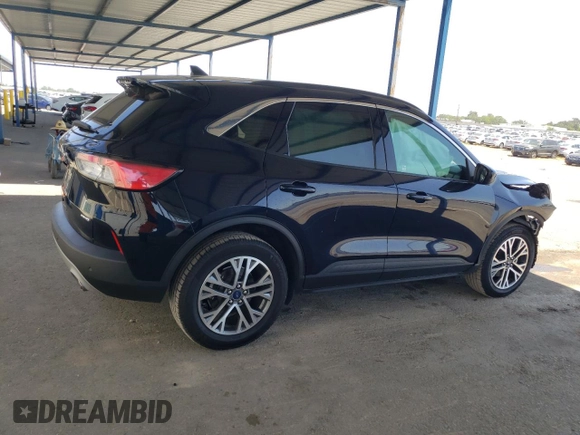 2021 Ford Escape SEL with VIN 1FMCU9H65MUA70490, listed as a Copart auction lot 57815275 with 62,227 mi miles and Salvage title. Bid and sale history available at DreamBid. Image 3.