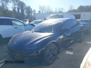 2022 Tesla Model 3 with VIN 5YJ3E1EA9NF147836, listed as a IAAI auction lot 41363603 with 28,748 mi miles. Bid and sale history available at carsss.com. Image 14.