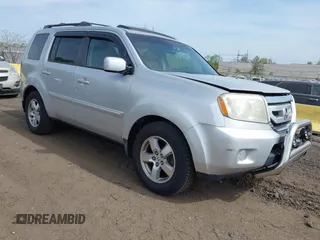 2009 Honda Pilot EX-L with VIN 5FNYF48599B025471, listed as a IAAI auction lot 42133938 with 217,105 mi miles. Bid and sale history available at carsss.com. Image 1.