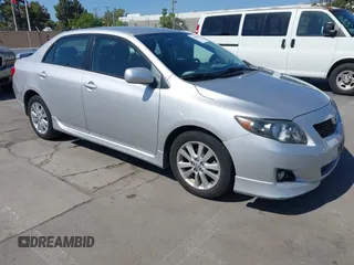 2009 Toyota Corolla with VIN 1NXBU40E69Z045543, listed as a IAAI auction lot 42201200 with 143,533 mi miles. Bid and sale history available at carsss.com. Image 1.