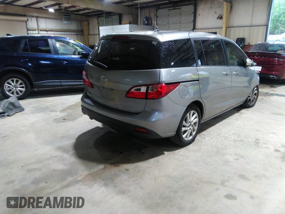 2013 Mazda 5 Sport with VIN JM1CW2BL5D0156684, listed as a IAAI auction lot 41966696 with 121,654 mi miles and . Bid and sale history available at DreamBid. Image 4.