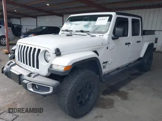2021 Jeep Gladiator Willys with VIN 1C6HJTAG0ML505674, listed as a IAAI auction lot 42249317 with 60,150 mi miles and . Bid and sale history available at DreamBid. Image 17.