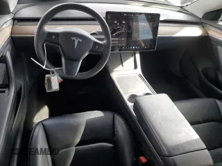 2023 Tesla Model 3 with VIN 5YJ3E1EA0PF449499, listed as a Copart auction lot 52900515 with 42,706 mi miles and Non Repairable. Bid and sale history available at DreamBid. Image 8.