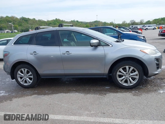 2011 Mazda CX-7 S Touring z VIN JM3ER4C30B0393887, wystawiony jako IAAI lot #42093166 z przebiegiem 123 920 mil mil oraz . Historia ofert i sprzedaży dostępna na DreamBid. Obrazek 13.
