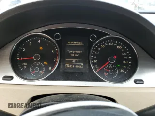 2010 Volkswagen CC Luxury z VIN WVWHP7AN9AE535737, wystawiony jako Copart lot #77401854 z przebiegiem 160 921 mil mil oraz Szkoda całkowita • Salvage title. Historia ofert i sprzedaży dostępna na DreamBid. Obrazek 9.